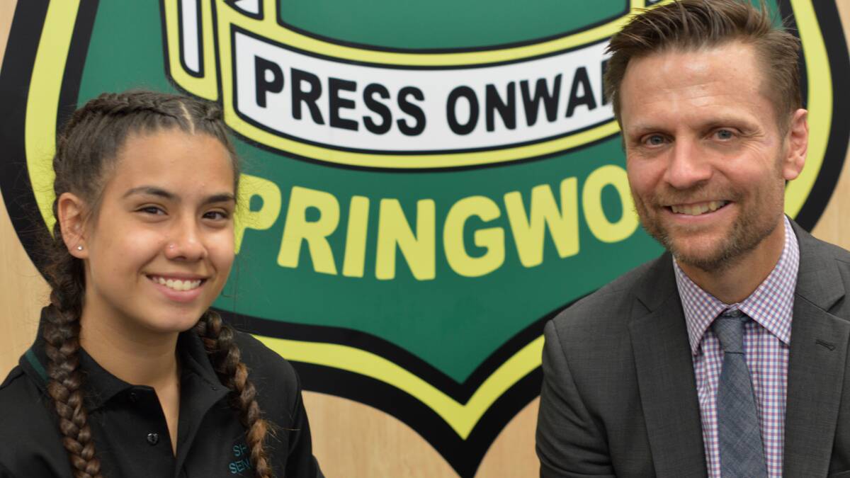 Desire to help others: Jessica Johnson, pictured with Springwood High School principal Mark Howie.