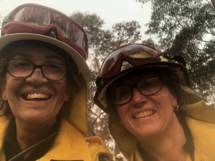 Celebrating women in the emergency services: Blaxland RFS members Del Gaudry and Wendy Hemmons.