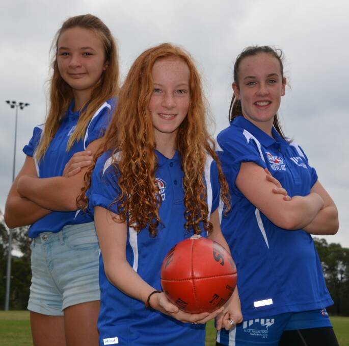Call-up: Casey Haydon, Maddie Van Til and Lily Van Til are keen to play AFL again this year and are encouraging other girls to give it a go.