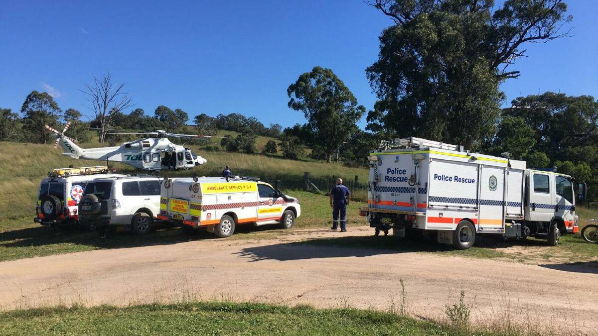 Snake bite: Emergency services attend to the American tourist in the Megalong Valley. Photo: Top Notch Video