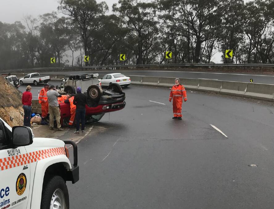 Mt Victoria accident: A car flipped onto its roof going down Victoria Pass on Saturday. Photo: SES