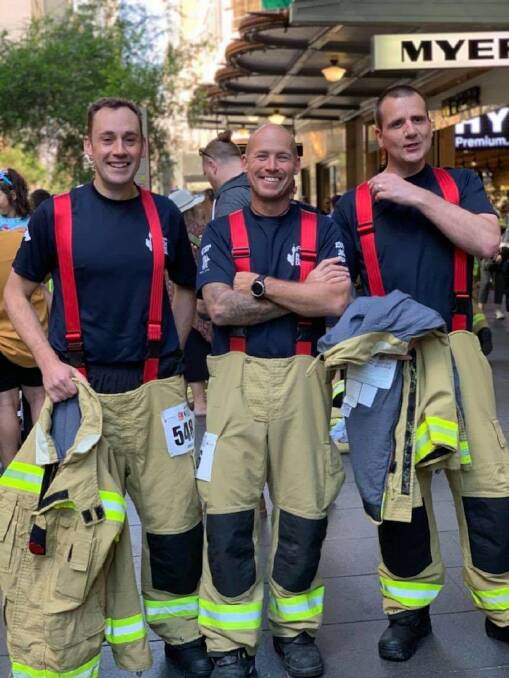 Gavin Clifton (centre) will do as many reps of Furber Steps as he can, to raise money for motor neurone disease. He's pictured with firefighters Greg Ritchie (left) and Matthew Hickey (right) before the 1504-step challenge in Sydney last year.