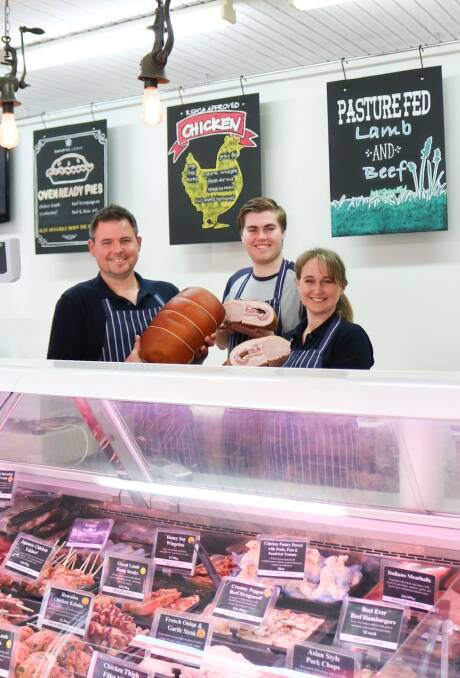 Bronze medal success: Michael Moore, Jared Loydell and Amy Moore from Moore and Sons Butchery with their award-winning ham and bacon.