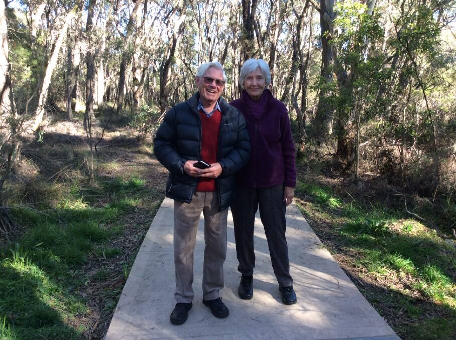 Neil and Barbara Buckland enjoy daily walks as part of Mr Buckland's recovery. They are pictured at Wentworth Falls lake.