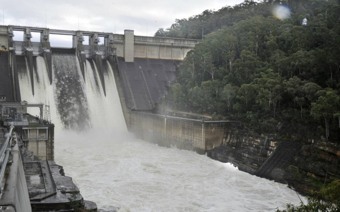 Overflowing in 2013: Warragamba Dam, four years ago. Environmentalists are opposed to plans to raise the dam wall by 14 metres.