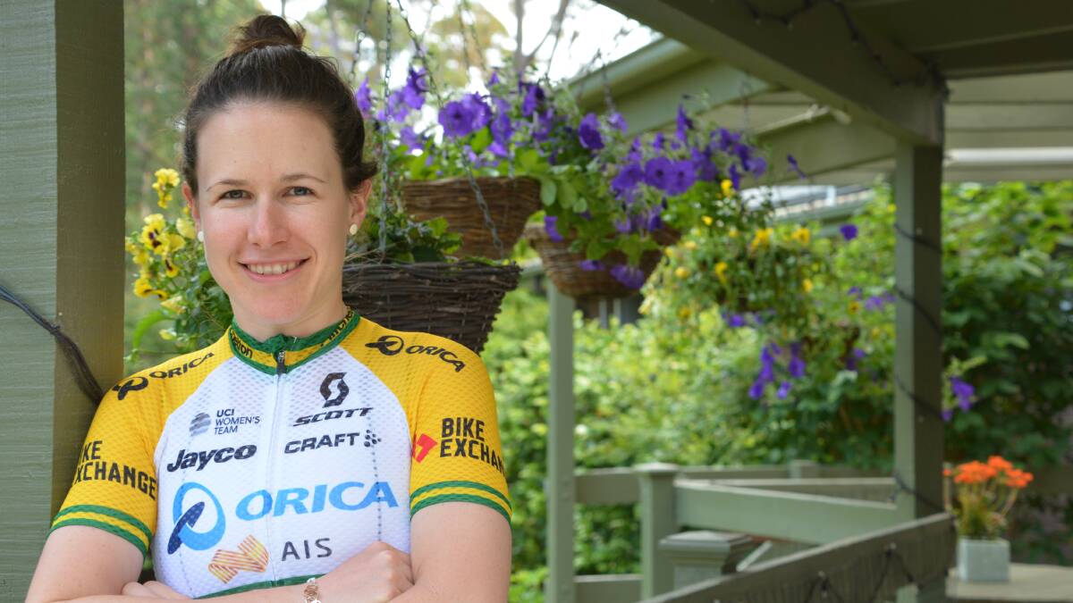 Good to be back: Cyclist Amanda Spratt, pictured at home in Springwood, is enjoying being home and is preparing to defend two titles in January.