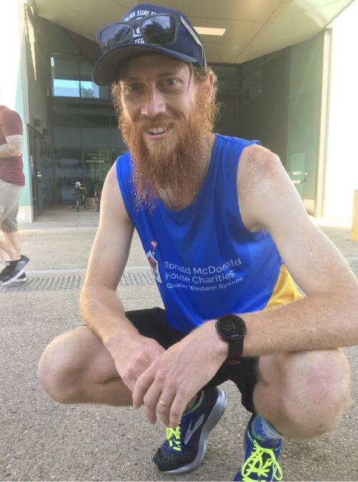 Done and dusted: John Turner at the finish of his 56km run to Nepean Hospital.