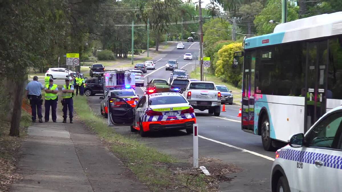 Possible spinal injuries: A woman was seriously injured in an accident on Hawkesbury Road on Sunday. Photo: Top Notch Video
