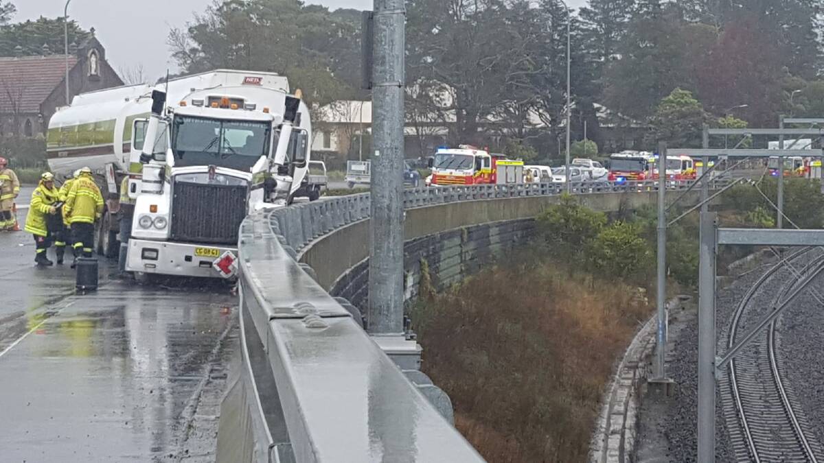 Crash: A fuel tanker crashed on the highway at Lawson on Monday during two days of wild weather in the Blue Mountains. Photo: Top Notch Video