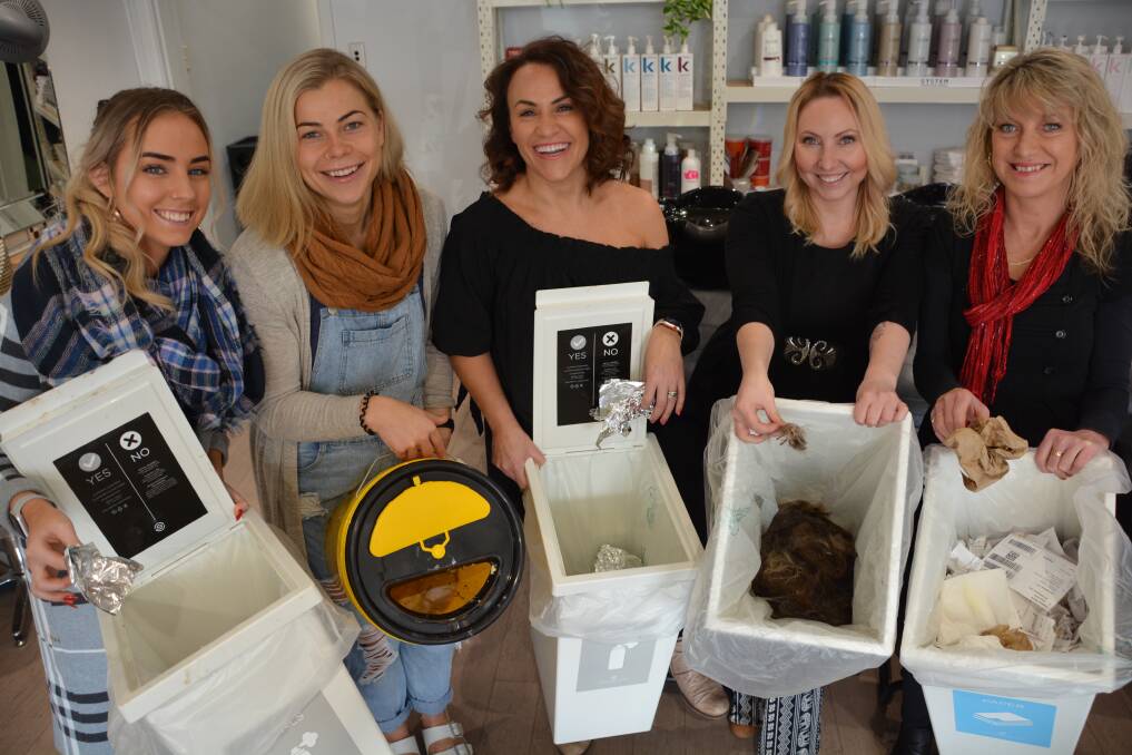 Going green: Abbey Maxwell, Naomi Brew, Tanya Evans, Lauren Noronha and Sue Dwyer from Nirvana Hair Studio with the separated waste for recycling.