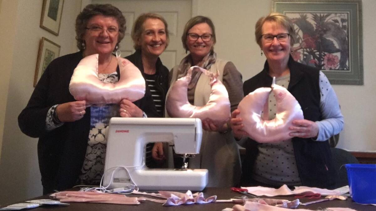 Zonta Club of the Blue Mountains members Kaydee Farley, Del Gaudry, Helen Grimson and Lyn Spratt with the newly made cushions.