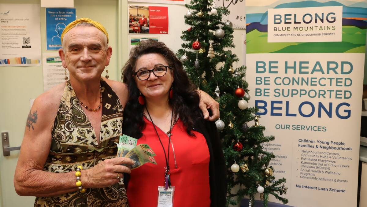 Noel Pope of Lawson dressed up for his Christmas fundraising, with Pauline Stafrace of Belong Blue Mountains.