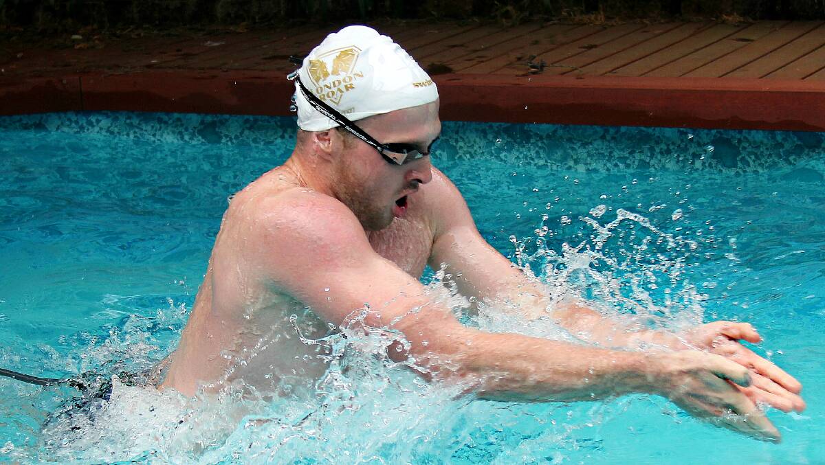 Matt Wilson training last year in the pool at his parents' home in Springwood.