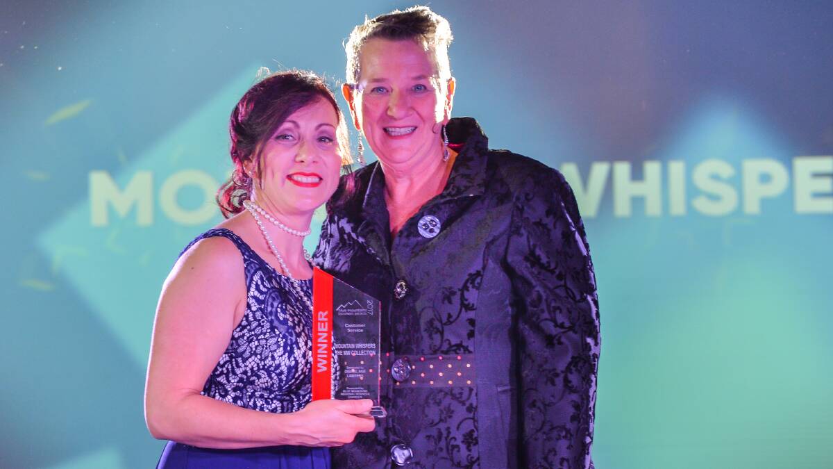 Mountain Whispers The MW Collection picking up their second for the night – The Customer Service Award being presented by Julie Bargenquast, Executive General Manager, Blue Mountains Regional Business Chamber on behalf of Digital Age Lawyers