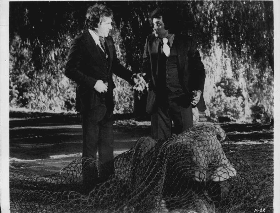  Pat Henry, left, and Frank Avianca capture a boxing kangaroo in Matilda. Picture: Supplied 