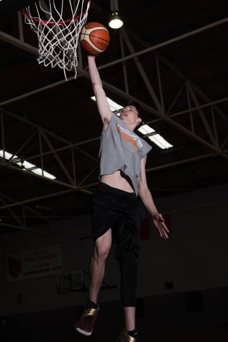 Ty Mitchell shows off his vertical leap at the Hawkesbury Indoor Stadium. Picture: Geoff Jones