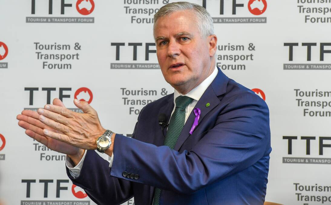 Deputy Prime Minister Michael McCormack delivering the keynote address to the Tourism and Transport Leadership Summit in Sydney last week. Photo Peter Rae.