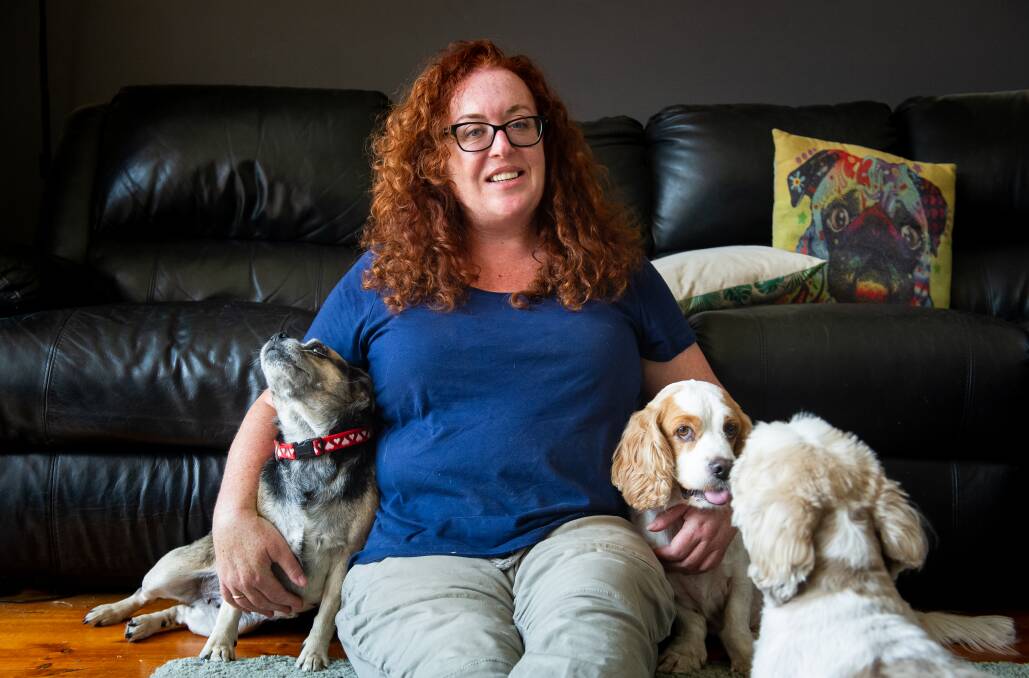 Heidi Pritchard, back home in Canberra, fled the fire with her dogs Tully, Hugo and Muppet. Picture: Elesa Kurtz