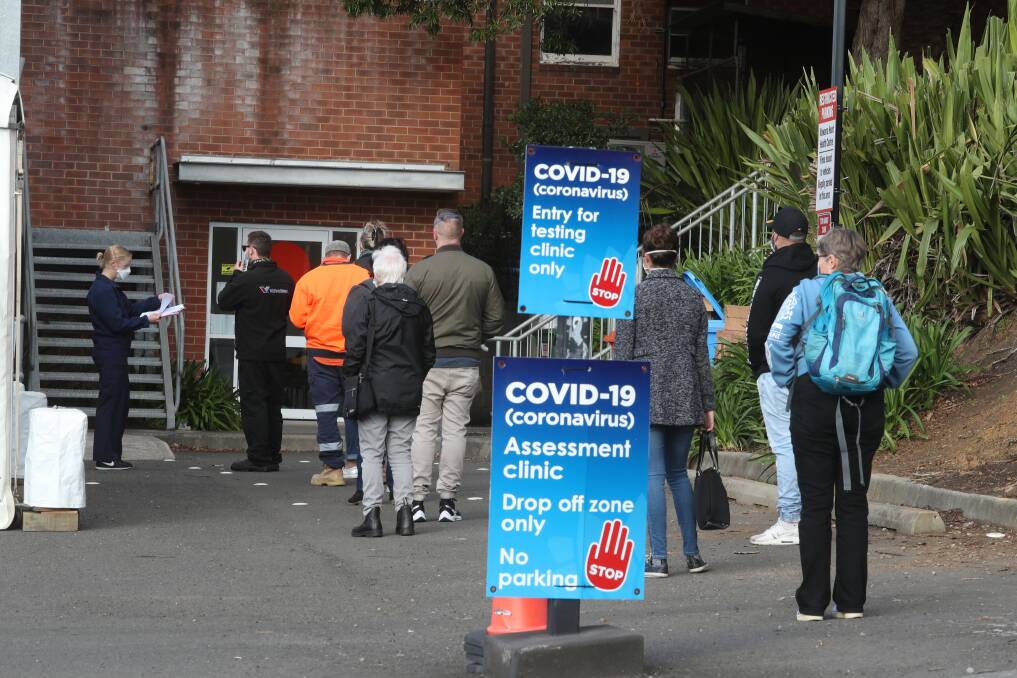 People lined up for testing at the COVID-19 testing facility at Wollongong Hospital. Picture: Robert Peet