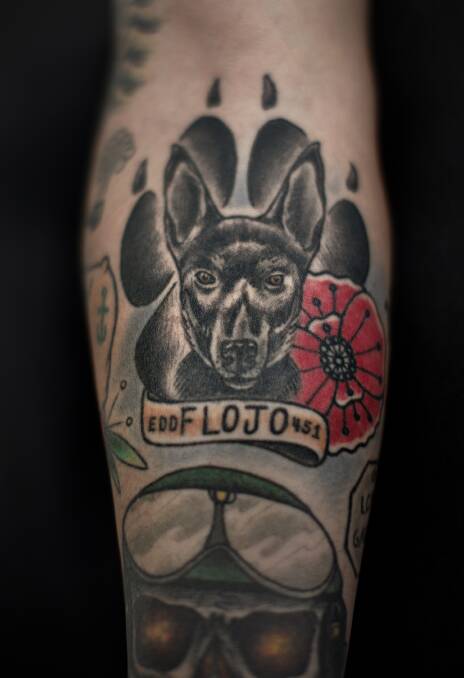 David Nicolson's tattoo of Flojo, the explosive detective dog. Picture: Bob McKendry / Australian War Memorial
