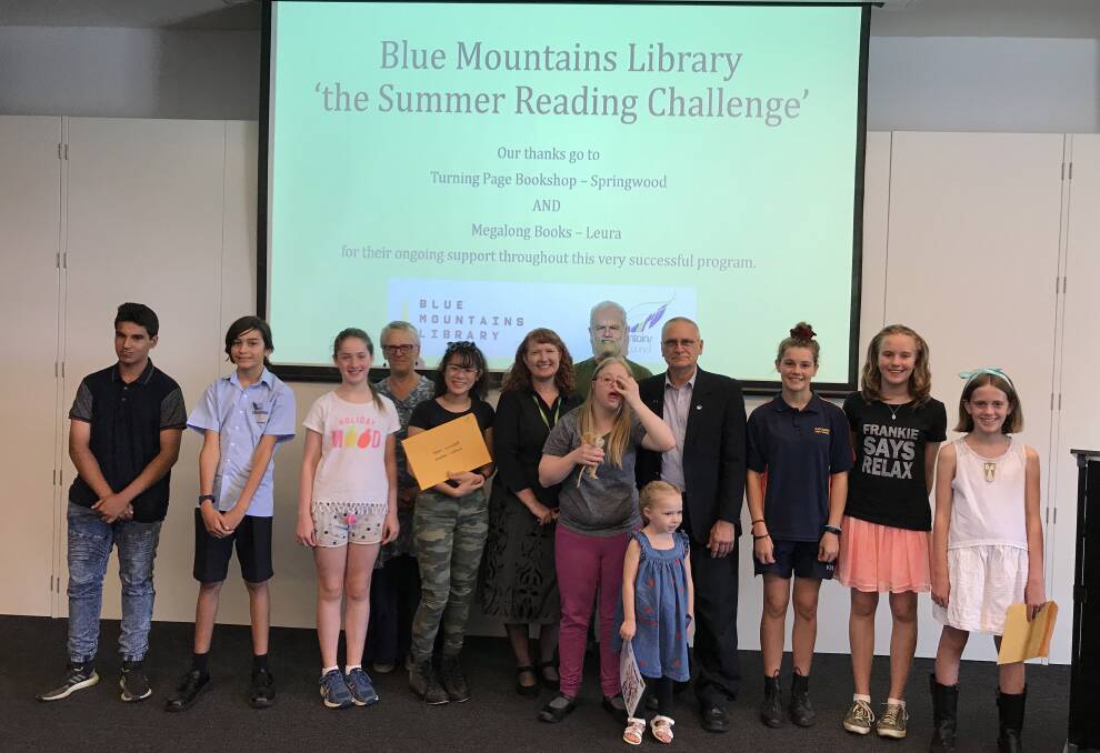Summer Reading Challenge winners and sponsors - Syed Ahmed, Luca Penserini, Abigail Dickens, Annie Sharkey from The Turning Page, Sarah Luong, Vicki Edmunds from Blue Mountains City Council, Amy Grieves, Alan Crooks from The Turning Page, Emma Glenfield, Deputy Mayor Cr Chris Van Der Kley, Ella-Beth Bonny, Emma Cranby and Madeline Brett-Hall.