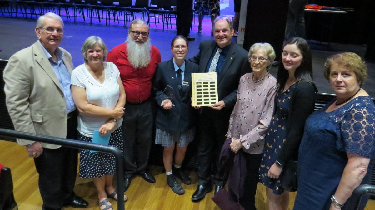From left, Past Rotary Governor John Wakefield OAM, Gaye Van Der Meer, Paul Henningham's son Craig Henningham, Sophie Connor, President John Van Der Meer, Paul Henningham's wife Peggy Henningham, Paul's granddaughter Sarah Murphy Anchor and Past Governor Susan Wakefield OAM.