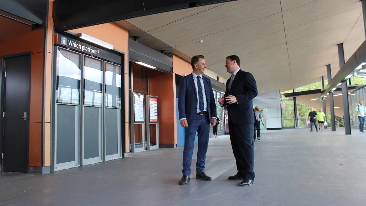 Defended timetable changes: NSW transport minister Andrew Constance (left) with Penrith MP Stuart Ayres at Penrith station last month.