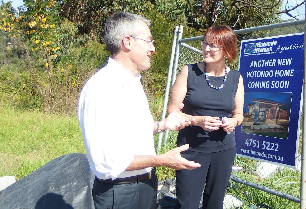Attacked insurance industry: Labor's shadow attorney-general and emergency services spokesman Mark Dreyfus with Labor candidate for Macquarie Susan Templeman at Winmalee on Thursday.