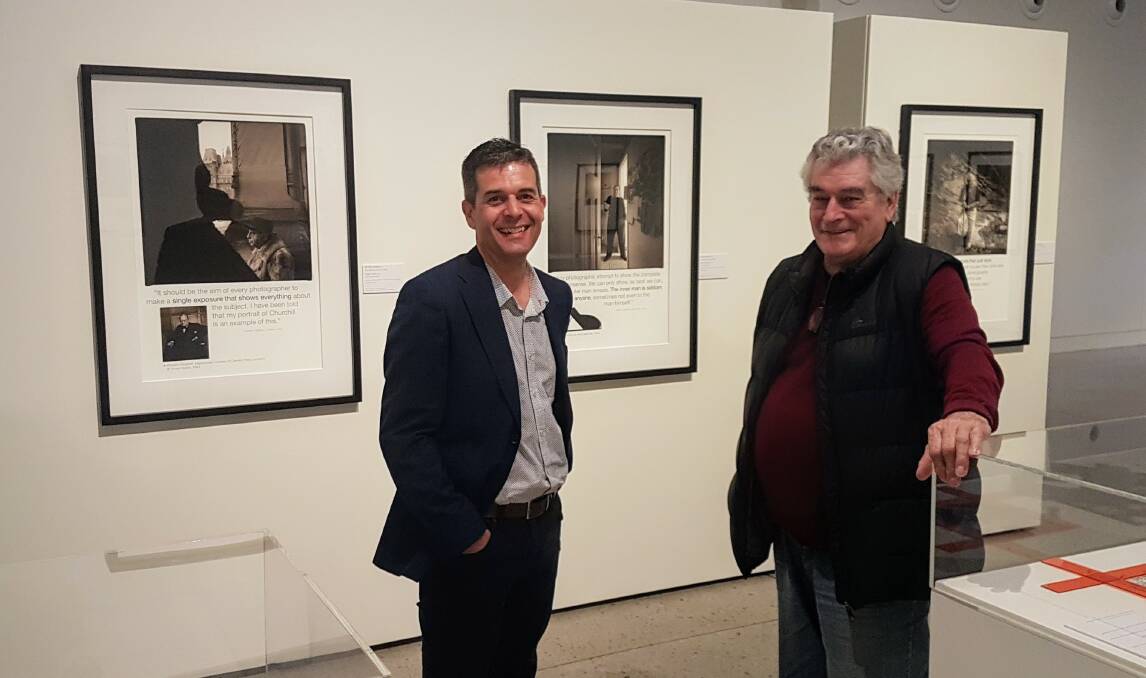 Blue Mountains Cultural Centre director Paul Brinkman and Peter Adams at the Katoomba photographer's exhibition in Katoomba.