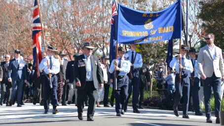 The Springwood Anzac Day march 2024 makes its way up Macquarie Road. Picture by Damien Madigan