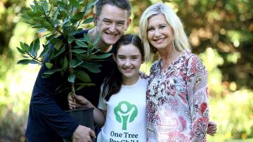 Katoomba's Jon Dee with his daughter Estelle Olivia Dee and Olivia Newton-John.