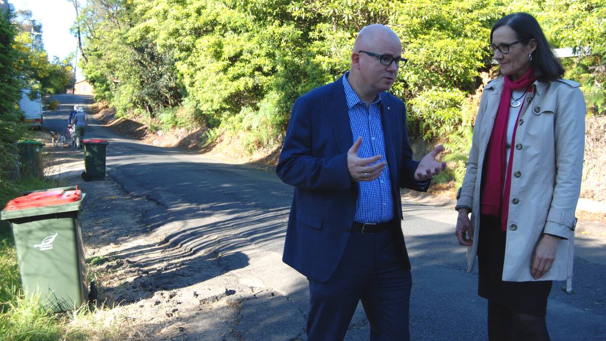 Blue Mountains mayor Mark Greenhill and Cr Romola Hollywood discuss footpath funding at Railway Parade, Faulconbridge.