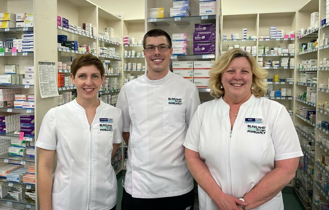Co-owner and pharmacist at the Blaxland Day n Night Pharmacy, Kim Stubbs (far right), with pharmacists Carolyn Gilholme and Peter Brown. 