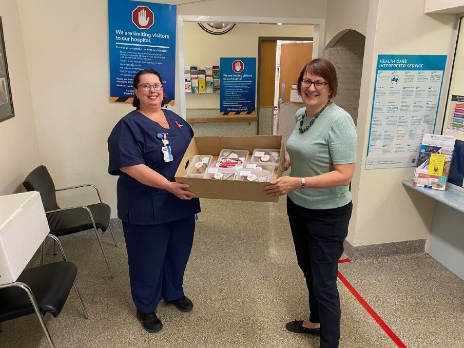 Federal Member for Macquarie Susan Templeman delivers sweet treats from the Ori Café to nurse Amanda as a thank you to Springwood Hospital staff for their efforts during the pandemic in May.