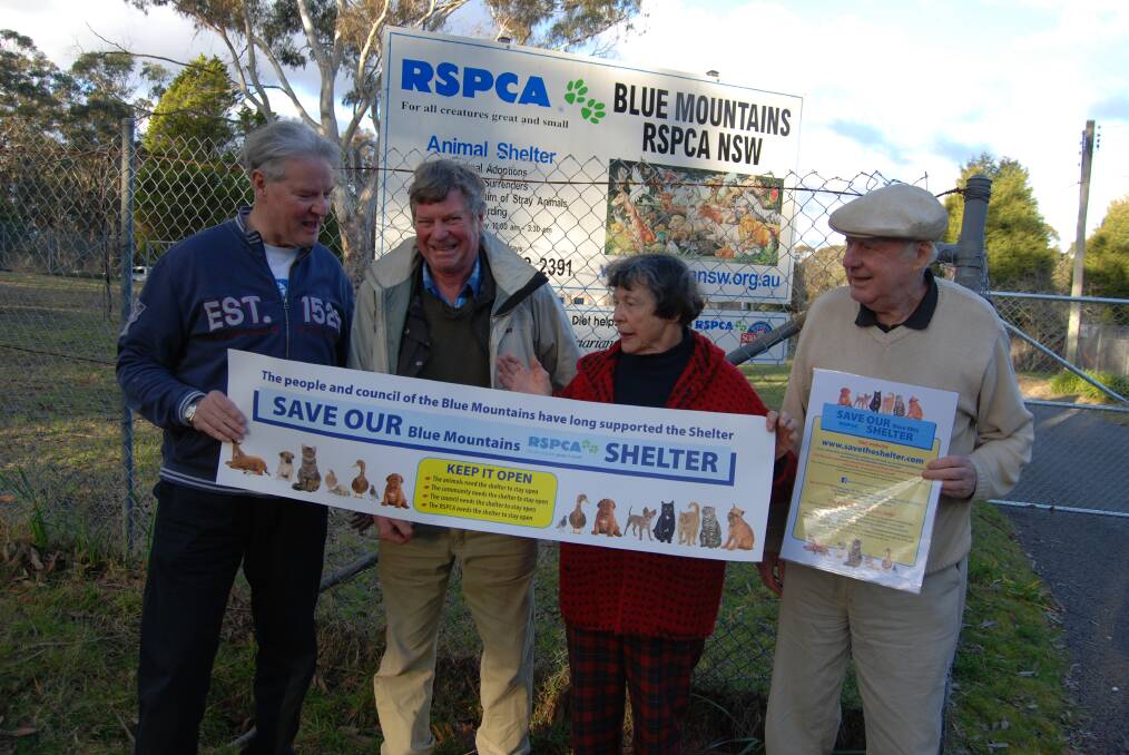 Victory in 2014: Tony Nikolich, Bob Kemnitz, Lorraine MacDonald and Bill Boldiston after RSPCA head office reversed its decision to close the Katoomba shelter.