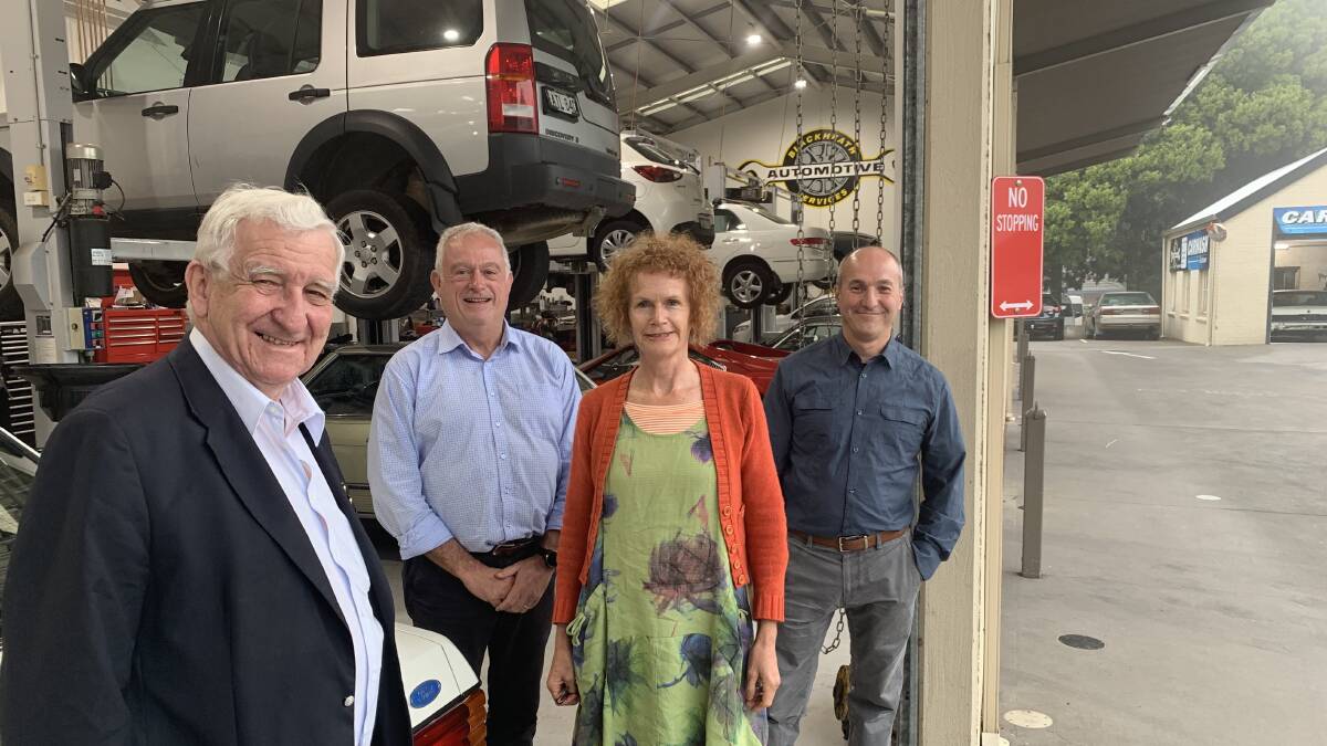 Councillor Kevin Schreiber, Katoomba Chamber President Mark Jarvis, Councillor Kerry Brown, Blackheath Chamber of Commerce President George Vergotis at his Blackheath Automotive workshop.