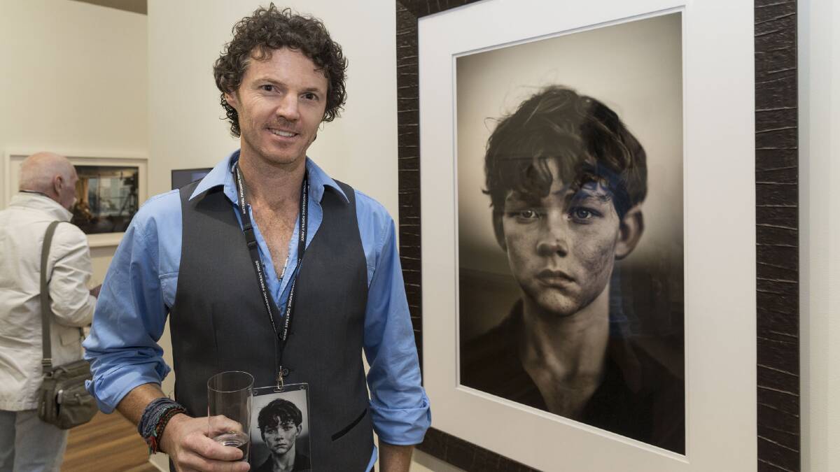 David Darcy with his prize-winning portrait of actor Levi Miller.