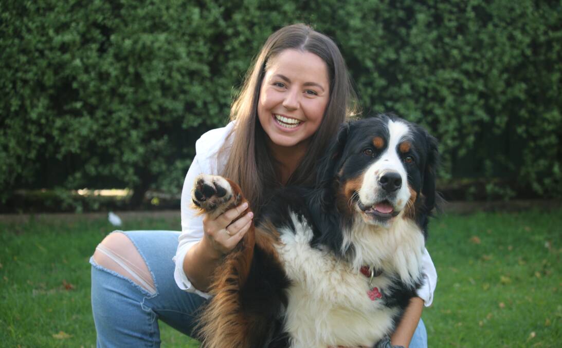 Tori McGregor and her dog, Baloo (also the head of customer happiness).