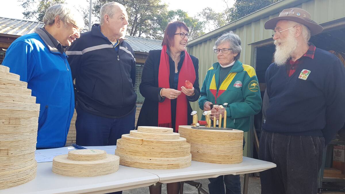 Macquarie MP Susan Templeman (centre) with members of the Blue Mountains Woodturners.