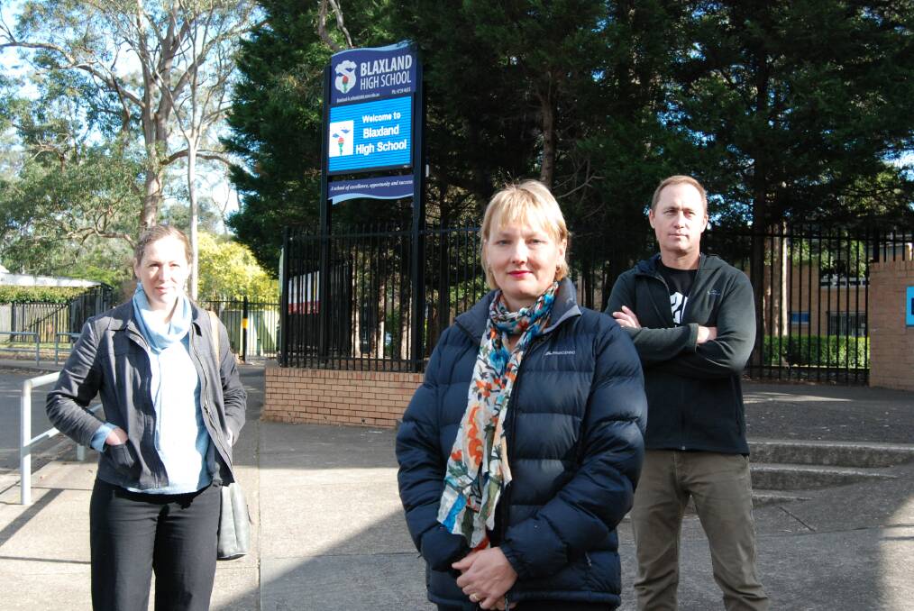 Blaxland High P&C representatives Robyn Totenhofer, centre, (president), Martin Muhlmann and Rachael Conner (vice president) are concerned by delays in air conditioning being installed at the school.