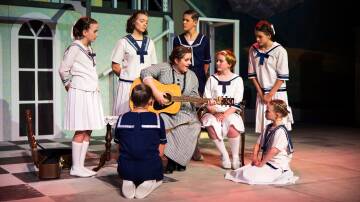 Melanie McLeod as Maria in Blue Mountains Musical Society's production of The Sound of Music at the Blue Mountains Theatre in Springwood with the von Trapp children, from left, Violet Fowler, Erin O'Reilly, William Moore (seated) Emerson Drew, Catherine Lane, Charlotte Scott and Emma Glenfield. Picture by Neaton Media