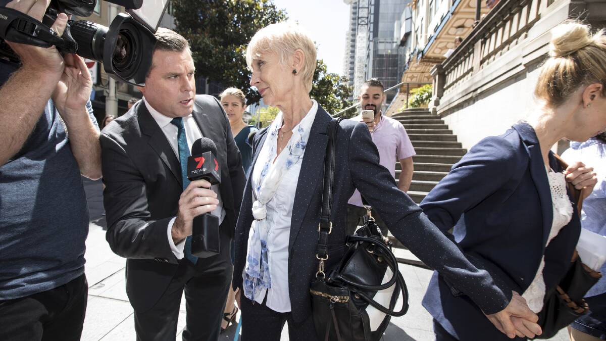 Charged with fraud: Genute Balsiene and her daughter Saule Baslyte leave the Downing Centre Courts after a hearing where the two have been accused of renting out their housing commission apartment. Photo: Jessica Hromas