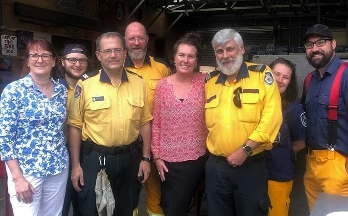 Federal Member for Macquarie Susan Templeman (left) and State Member for Blue Mountains Trish Doyle (centre) with members of Woodford Rural Fire Service.