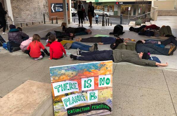 Taking a stand: Protesters at the Extinction Rebellion 'die-in' in Katoomba.