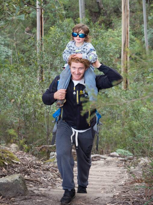 David Gliddon with his two-year-old son Phoenix coming out of the Grand Canyon in September.
