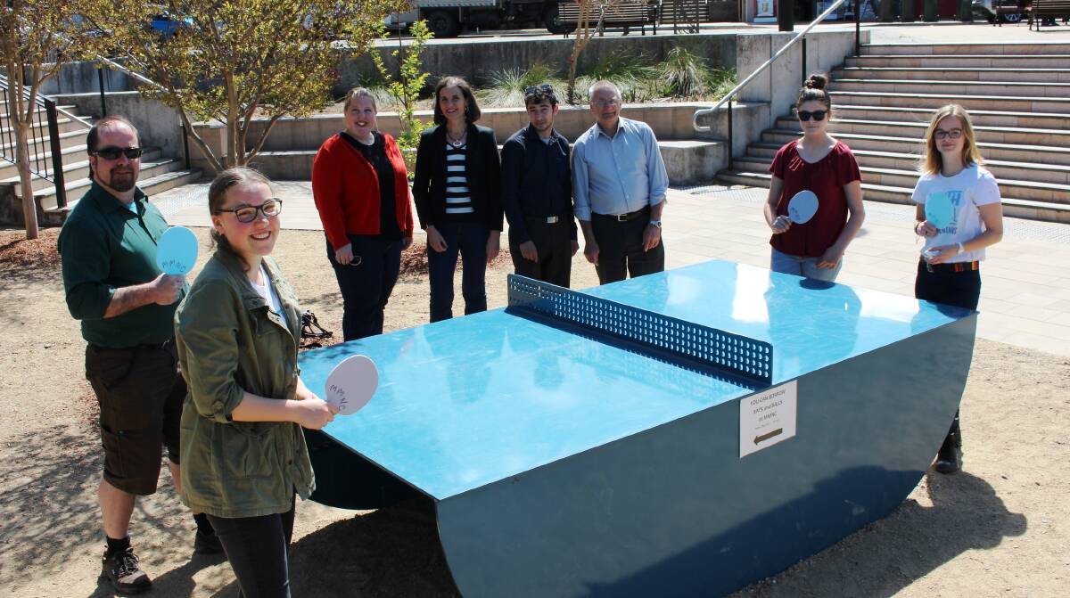 Ward 2 Councillors, Brent Hoare (left), Romola Hollywood (striped top) and Chris Van der Kley (right) get ready to enjoy a game of outdoor ping pong in the sunshine with Blue Mountains Youth Councillors Brodie Wylde, Delilah Scott, Caitlin Marlor and Ben McGrory, and Mid Mountains Neighbourhood Centre Community Development Worker Danielle Wilding-Forbes (red top).
