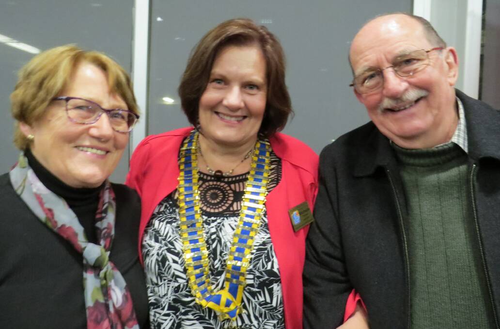 New president: Lower Blue Mountains Rotary's Michelle Fisher (centre) with her parents Francisca and Bernard Fisher following her induction.
