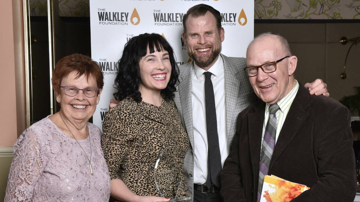Award win: Kate Hennessy (second from left) with her husband Tyler Broyles, and parents Denise and Roger Hennessy.
