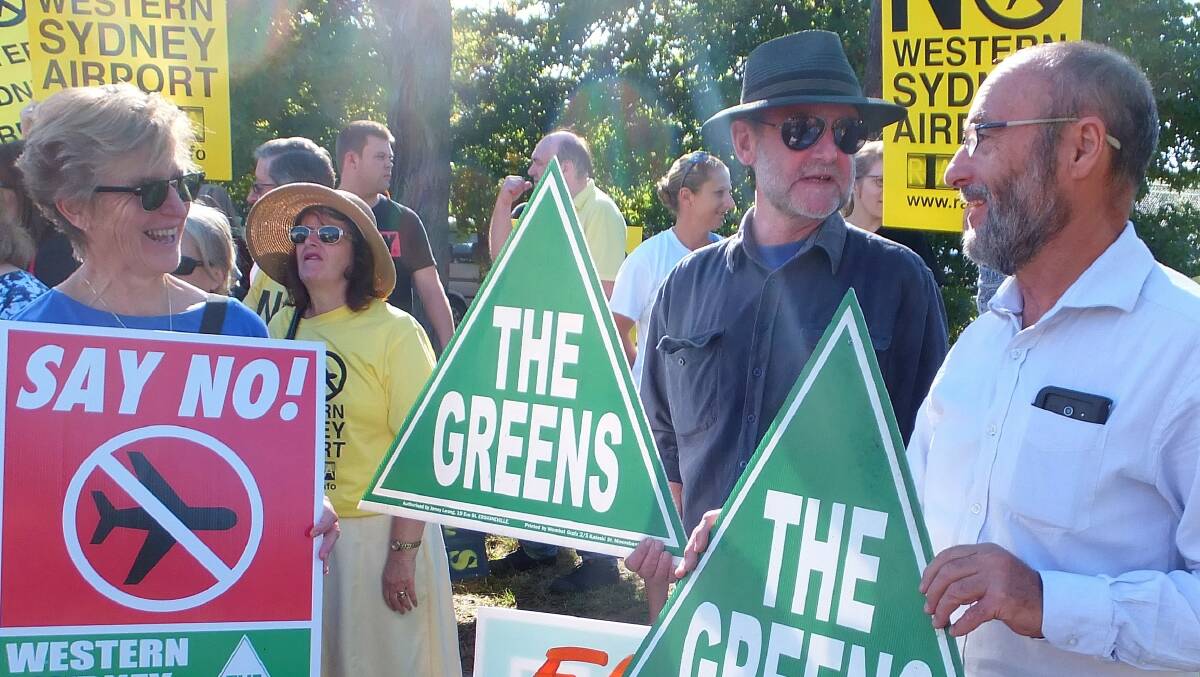 Opposed to second airport: Greens candidate for Macquarie Terry Morgan (right) at an anti-airport rally.