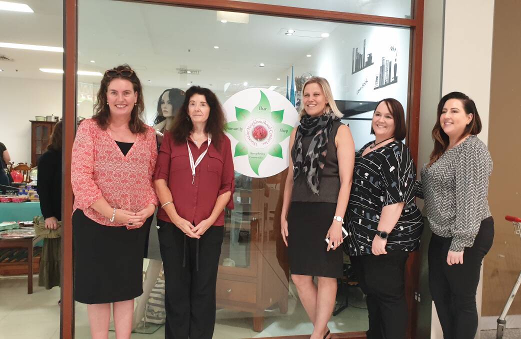 Blue Mountains MP Trish Doyle, Winmalee Neighbourhood Centre manager Morna Colbran with property investment manager Bianca Barrett, administration manager Nicole Miles and portfolio marketing manager Lisa Mourga at the official opening of Our Community Shop in Winmalee Village shopping centre.
